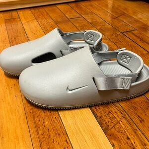Nike Calm Mules  Light Smoke Grey/Light
Smoke Grey Size M 7 / W 8.5